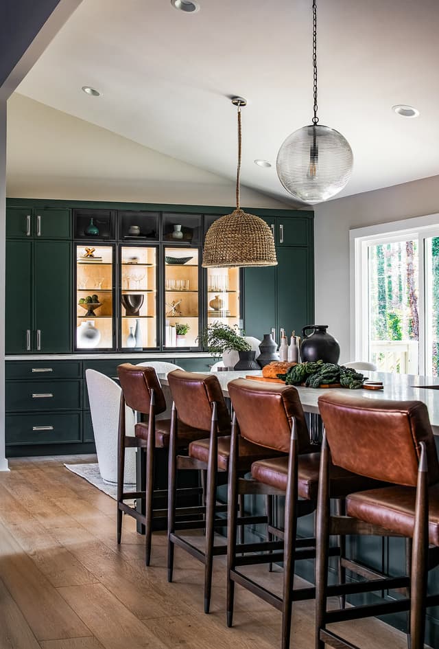HGTV-featured dining and kitchen with emerald green and natural oak cabinetry