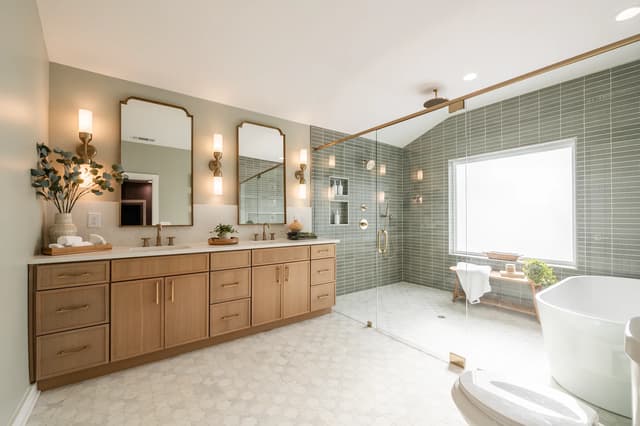 HGTV-featured spa bathroom with natural oak vanity and sage tile